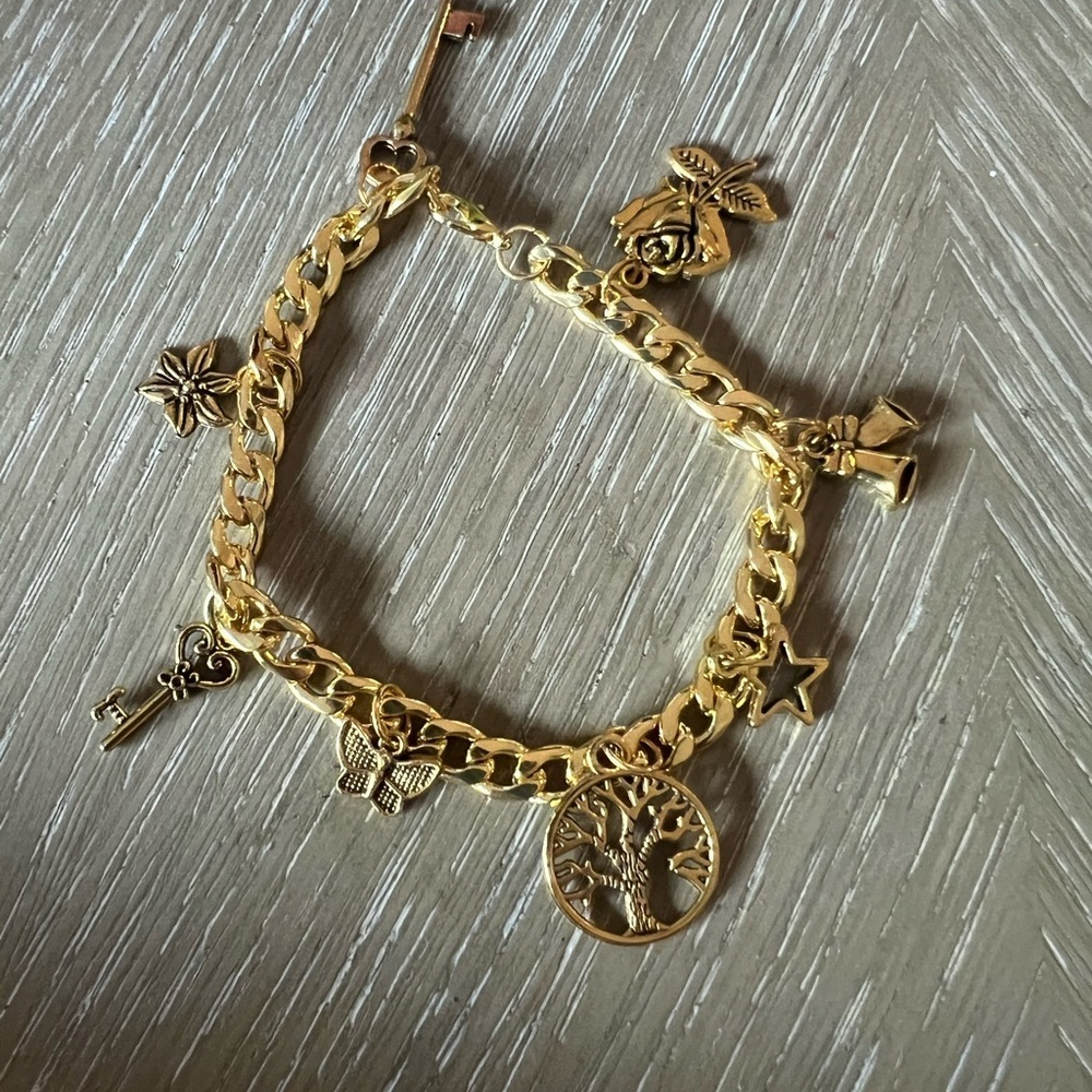 Gold Charm Bracelet with Intricate Details